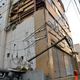 Debris litter the ground next to a damaged building after a strong earthquake hit overnight in Sapporo.
